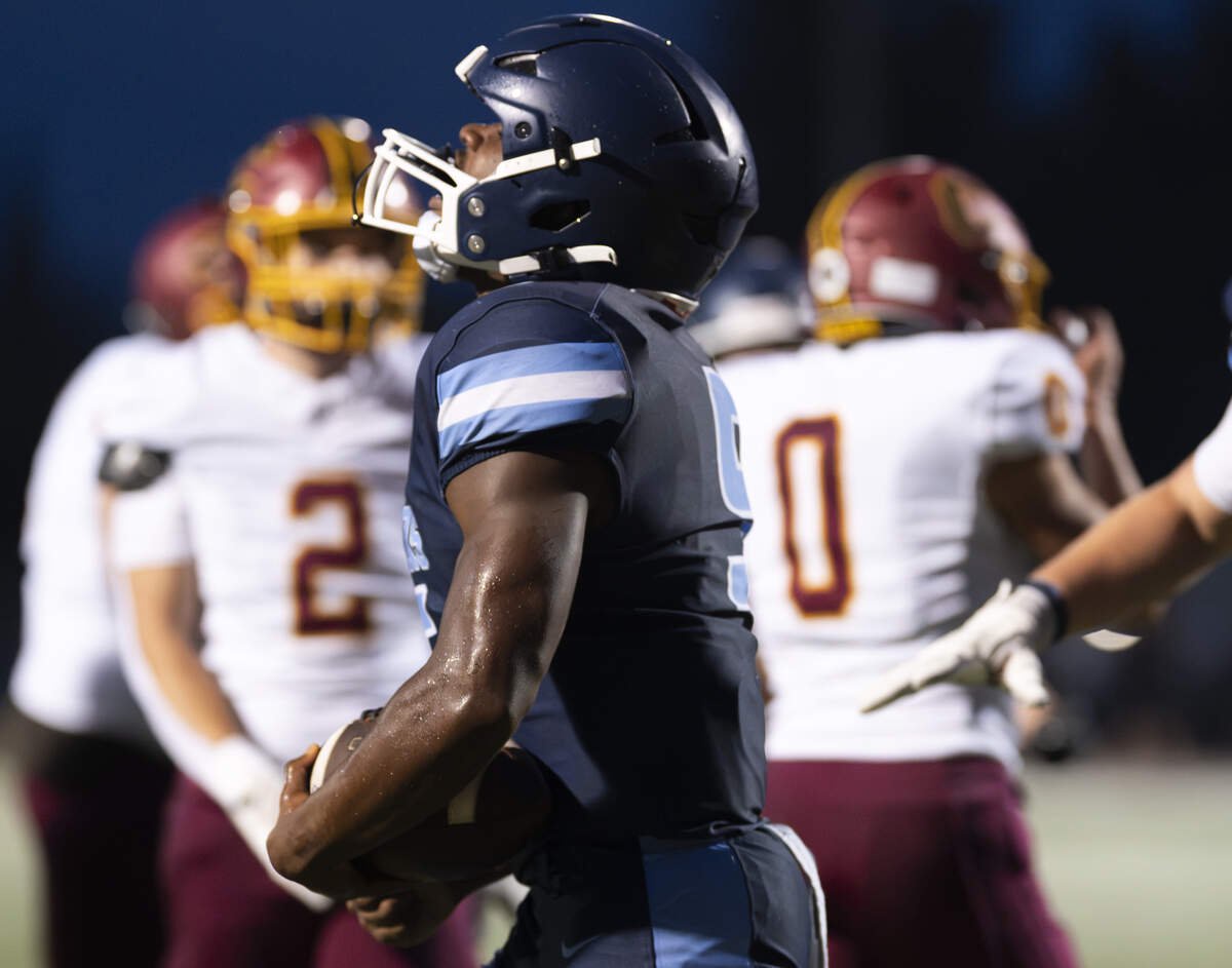 Olympia running back Ibrahima Diallo (5) reacts to his touchdown against Capital High School during the first half of the game at Ingersoll Stadium, on Friday, Sept. 4, 2026, in Olympia.