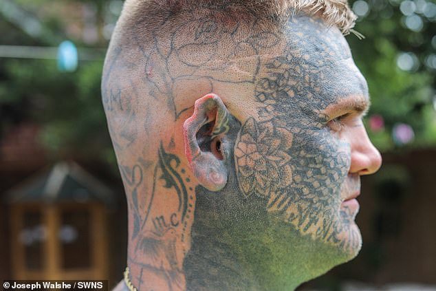 Mr Howman has tattoos all over his body and head