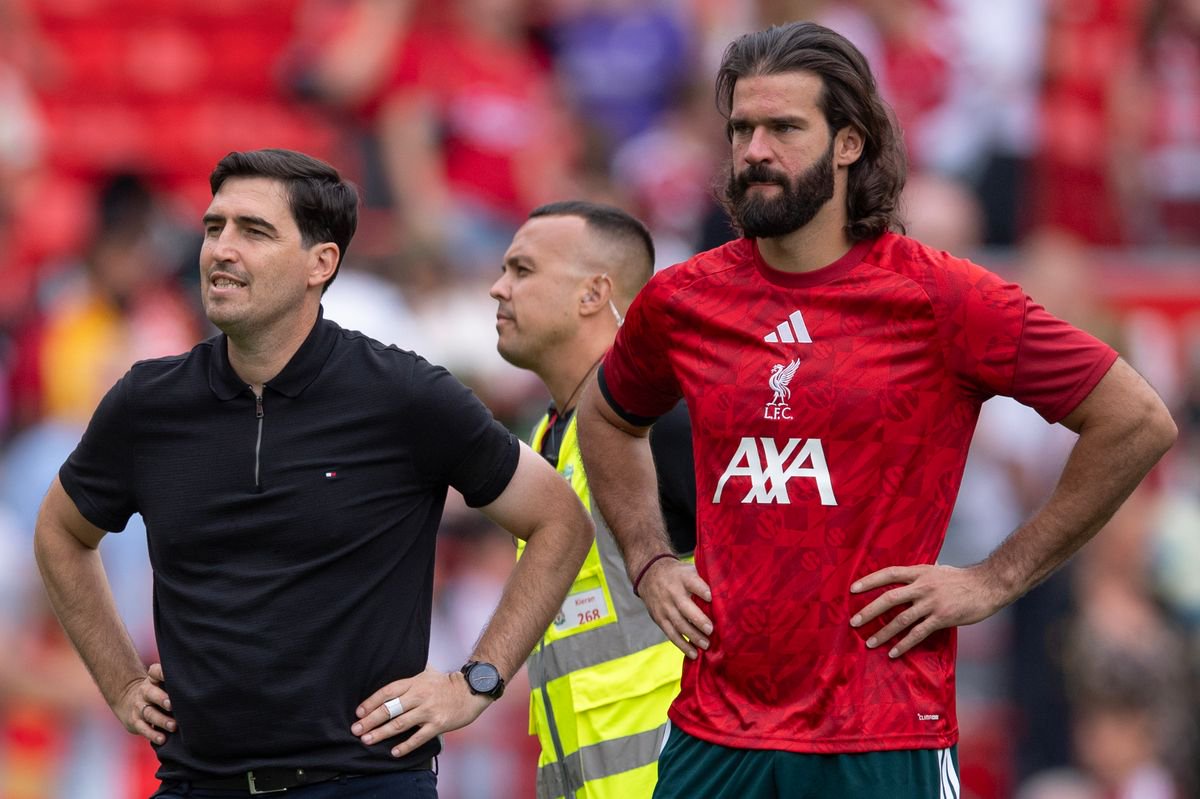 Liverpool head coach Andoni Iraola and goalkeeper Alisson Becker after the pre-season friendly match between Liverpool FC and AS Monaco at Anfield 