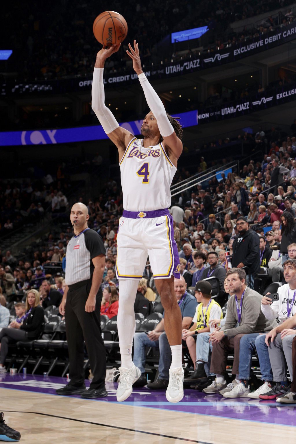 Los Angeles Lakers guard Matisse Thybulle (4) shoots a 3-point basket against the Utah Jazz during an NBA basketball game at Delta Center in Salt Lake City, Sunday, Oct. 25, 2026.