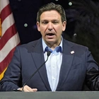 Florida Gov. Ron DeSantis signs a bill that strikes climate change from state law