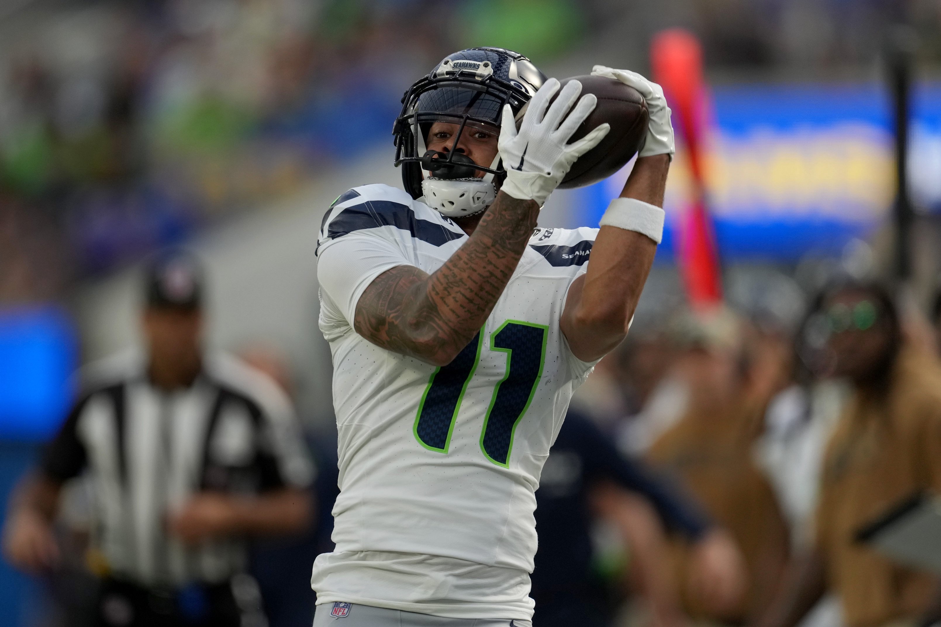 Nov 19, 2023; Inglewood, California, USA; Seattle Seahawks wide receiver Jaxon Smith-Njigba (11) makes a catch in the first quarter against the Los Angeles Rams at SoFi Stadium. Mandatory Credit: Kirby Lee-USA TODAY Sports