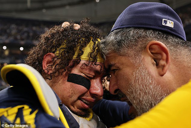 Contreras is captured on the brink of tears as he emotionally celebrates the triumph
