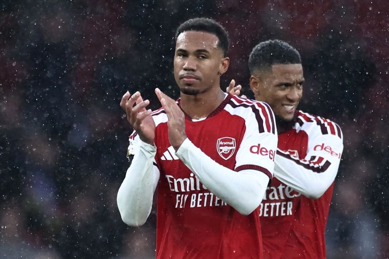 Arsenal's Brazilian defender #06 Gabriel Magalhaes (L) and Arsenal's English defender #15 Ezri Konsa (R) applaud fans after the English Premier League football match between Arsenal and Everton at the Emirates Stadium in London on October 24, 2026.