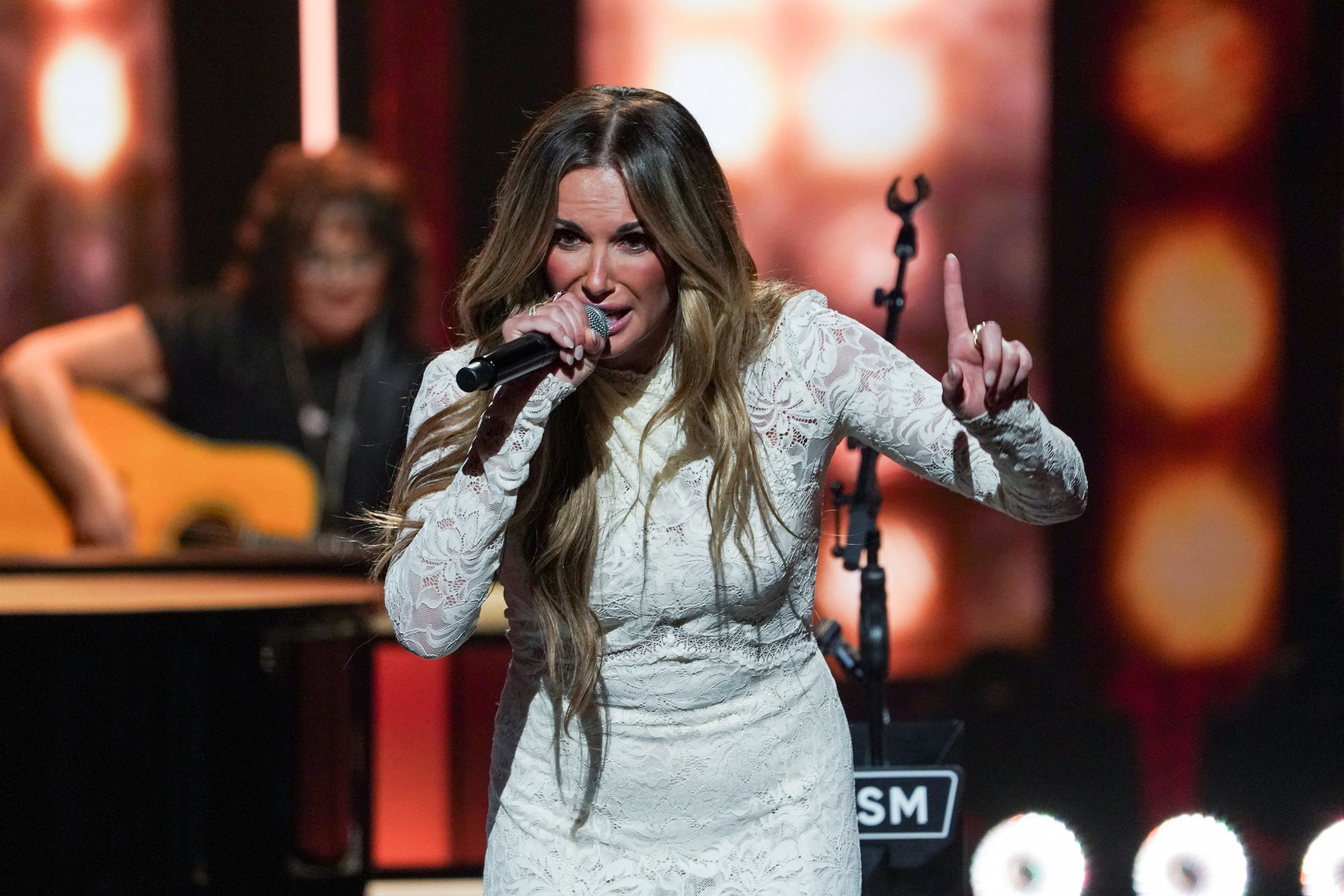Carly Pearce performs at a tribute to the late Dolly Parton at the legendary country music venue, the Grand Ole Opry in Nashville, Tennessee on Aug. 29, 2026.