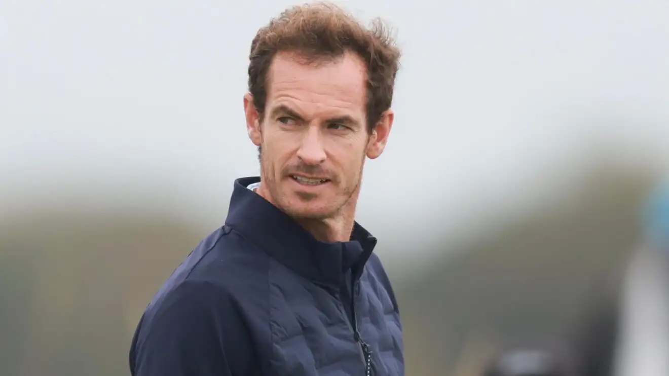 Pictured: Andy Murray looks on