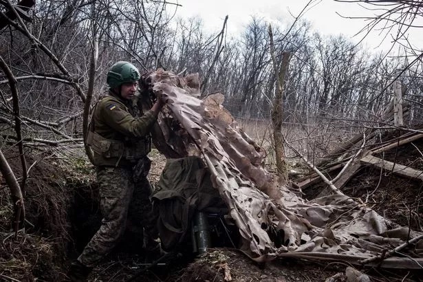 Ukrainian servicemen of 24th brigade operate an 82mm mortar near the frontline in Toretsk as the war between Russia and Ukraine continues in Toretsk, Ukraine on March 27, 2024