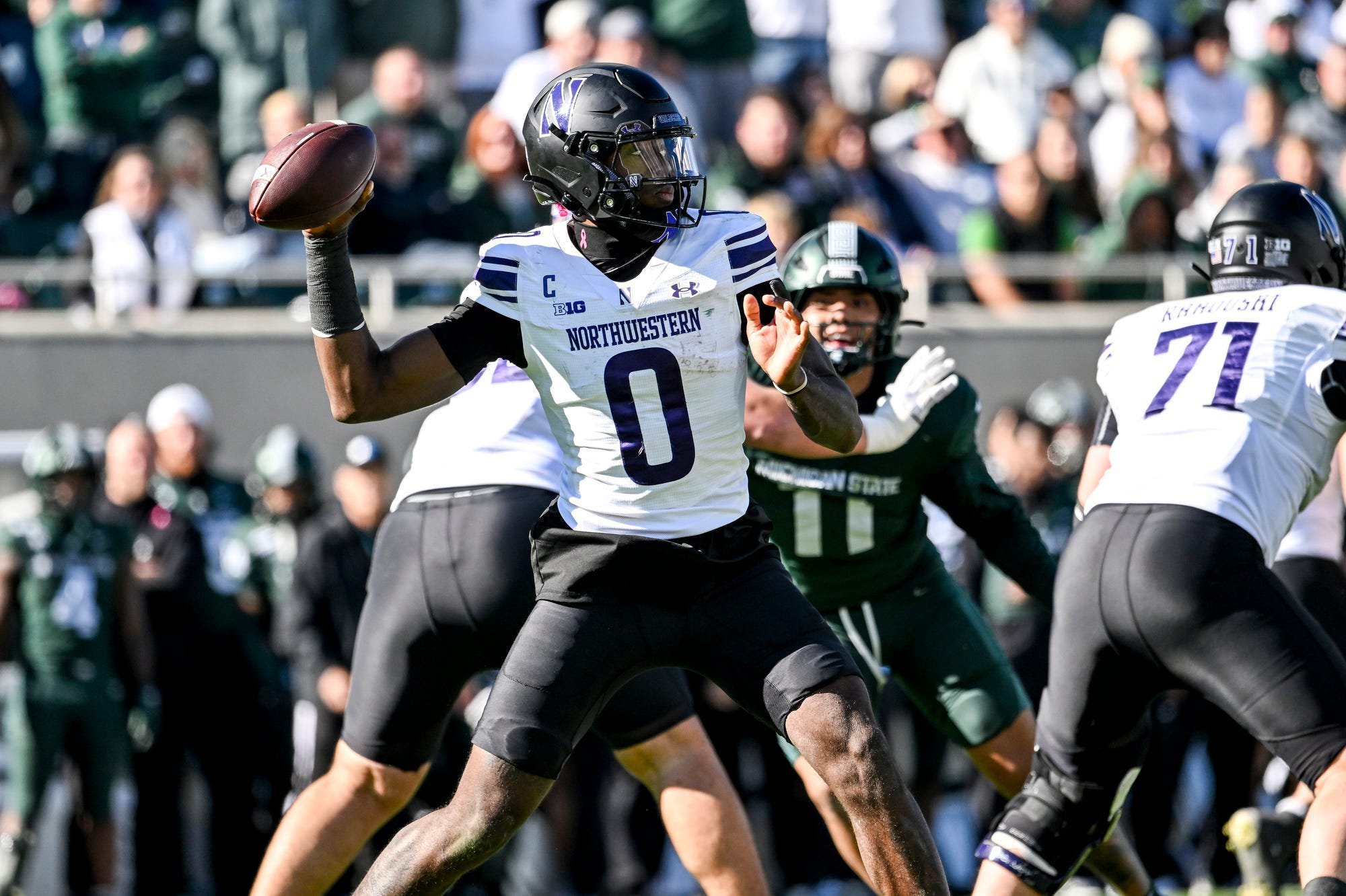 Northwestern’s Aidan Chiles throws a pass against Michigan State during the fourth quarter on Saturday, Oct. 17, 2026, at Spartan Stadium in East Lansing.