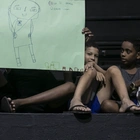 Kids’ drawings reflect regular violence shaping their lives in a Rio de Janeiro favela