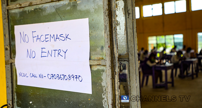Wearing face-masks, final year students of Government Secondary School, Zone 3, Abuja, sit in a classroom as they write their West African Examinations Council exams, following the ease of COVID-19 lockdown order on Monday August 17, 2020. Photo: Sodiq Adelakun/Newspot.