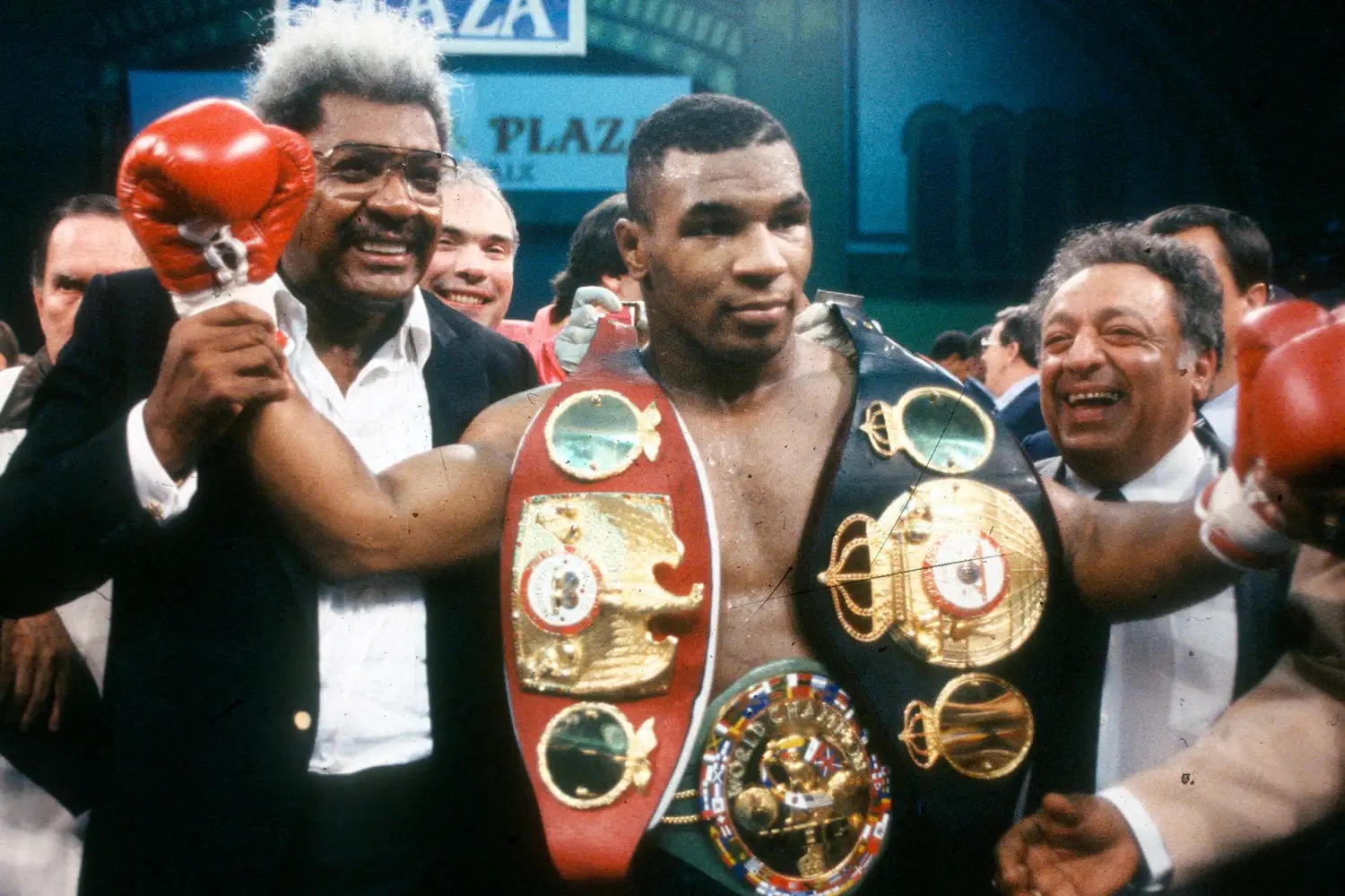 Mike Tyson and Don King celebrates after Tyson defeated Carl Williams for the WBA, WBC and IBF heavyweight tittles on July 21, 1989.