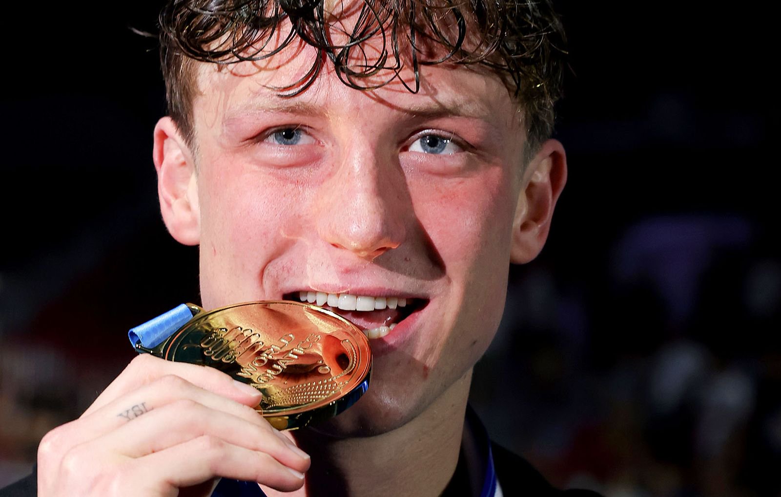 Gold medalist Pieter Coetze of Team South Africa poses during the Men’s 100m Backstroke medal ceremony on day 19 of the Singapore 2025 World Aquatics Championships at World Aquatics Championships Arena on July 29, 2025 in Singapore. (Photo by Lintao Zhang/Getty Images)