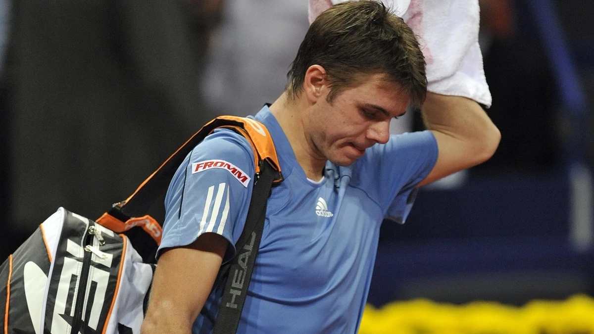 Switzerland's Stanislas Wawrinka leaves the court after losing against Germany's Benjamin Becker after their first round match of the Davidoff Swiss Indoors tennis tournament in Basel, Switz ...