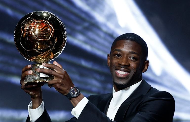 Paris St Germain’s Ousmane Dembele celebrates after winning the 2025 men’s Ballon d’Or award