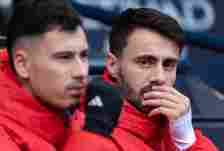 Fabio Vieira and Gabriel Martinelli of Arsenal on the substitutes bench before the Premier League match between Manchester City and Arsenal FC at E...
