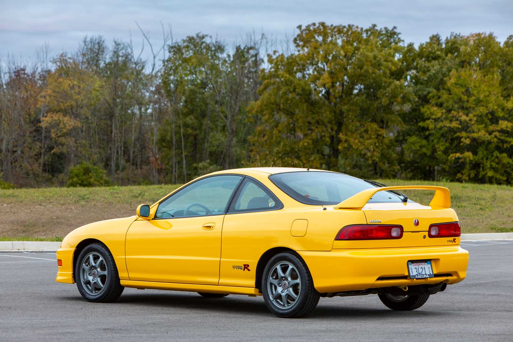 rear three-quarters shot of a 2001 Acura Integra Type R in Yellow