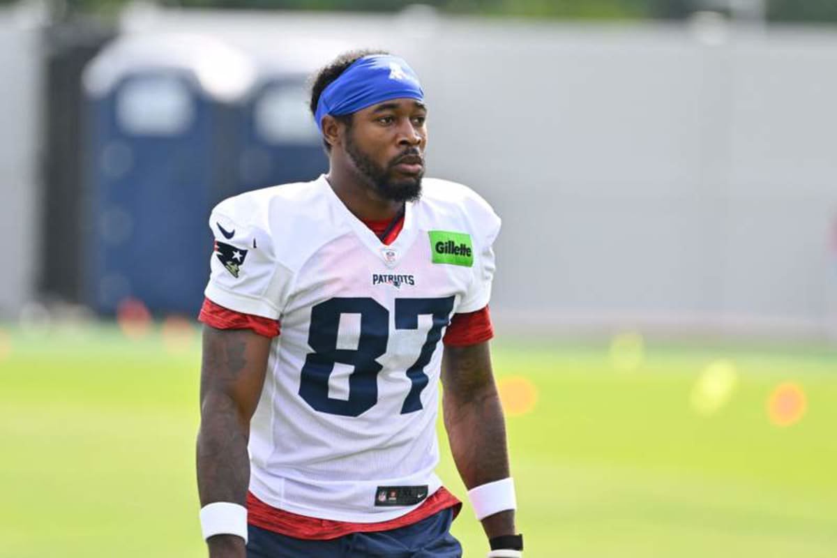 Jul 28, 2026; Foxborough, MA, USA; New England Patriots wide receiver Romeo Doubs (87) walks to practice for training camp at Gillette Stadium. © Eric Canha-Imagn Images
