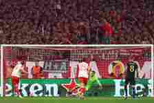 Harry Kane celebrates scoring a goal for Bayern Munich