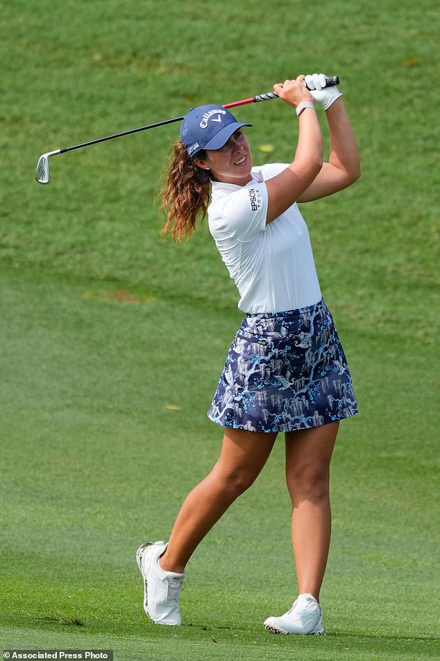 Sophia Schubert, of the United States, watches her approach shot on the second hole during the first day of LPGA Maybank Championship in Kuala Lumpur, Malaysia, Thursday, Oct. 29, 2026. (AP Photo/Vincent Thian)