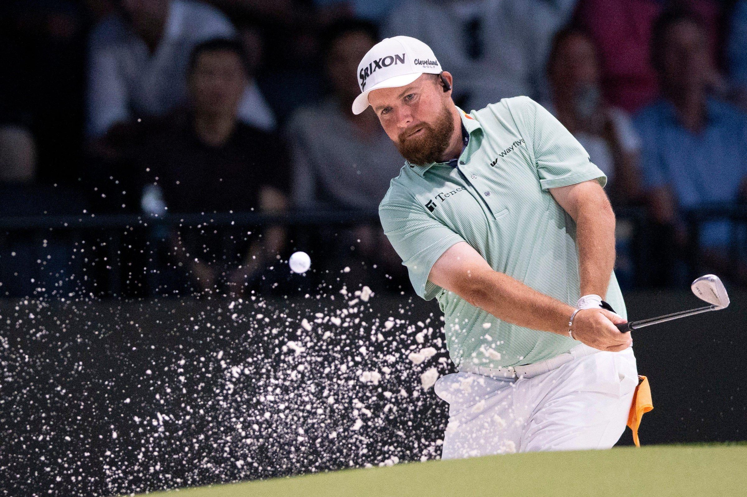 Shane Lowry of Bay Golf Club hits out of the bunker against Atlanta Drive GC in the TGL semifinal match at SoFi Center on March