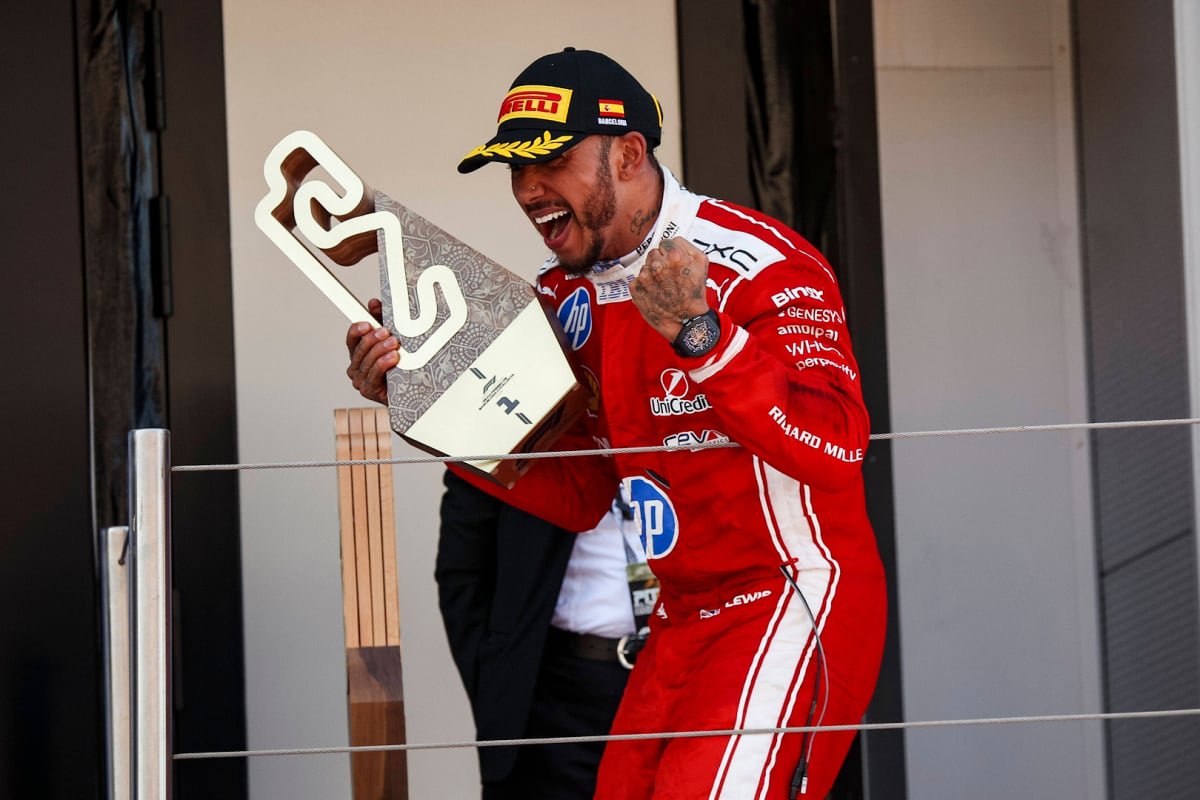 Lewis Hamilton celebrates on the podium at the Barcelona GP — Photo: © IMAGO
