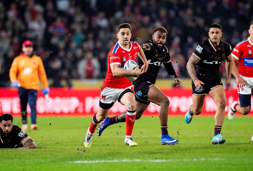 Arthur Mourgue skips clear of Ezra Mam during Hull KR's World Club Challenge win over the Broncos.