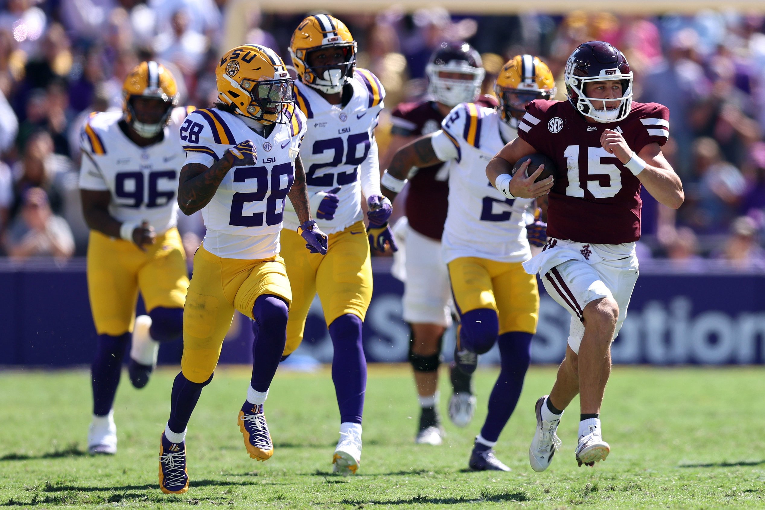 Oct 17, 2026; Baton Rouge, Louisiana, USA;  Mississippi State Bulldogs quarterback Parker Puckett (15) runs with the ball during the second half against the Louisiana State Tigers at Tiger Stadium.  Mandatory Credit: Stephen Lew-Imagn Images