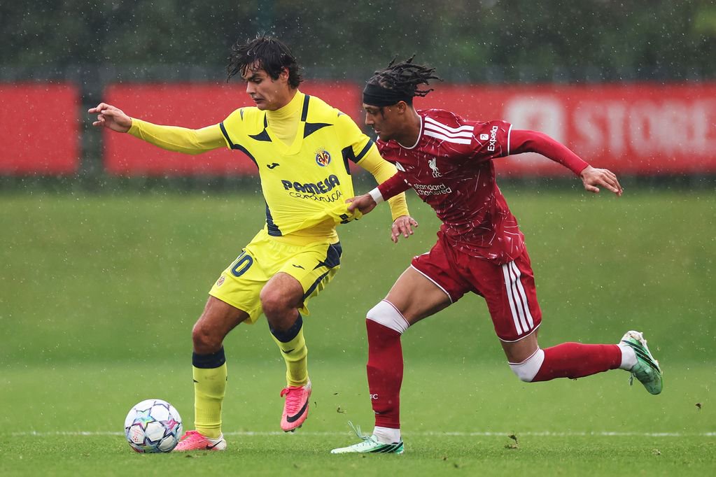 Mauro Roca of Villarreal is tackled by Lenix Conde of Liverpool during the UEFA Youth League match in October 2026.