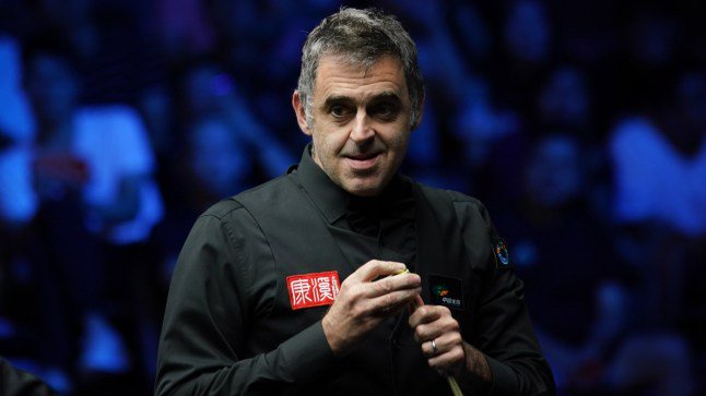 WUHAN, CHINA - AUGUST 27: Ronnie O'Sullivan of England chalks the cue in the quarterfinal match against Mark Selby of England on day 5 of Wuhan Open 2026 at the Optics Valley Gymnasium of Huazhong University of Science and Technology on August 27, 2026 in Wuhan, Hubei Province of China. (Photo by Tai Chengzhe/VCG via Getty Images)