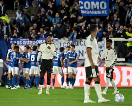 Manchester United's players react after Como scored their fourth night on a sobering night in Italy.