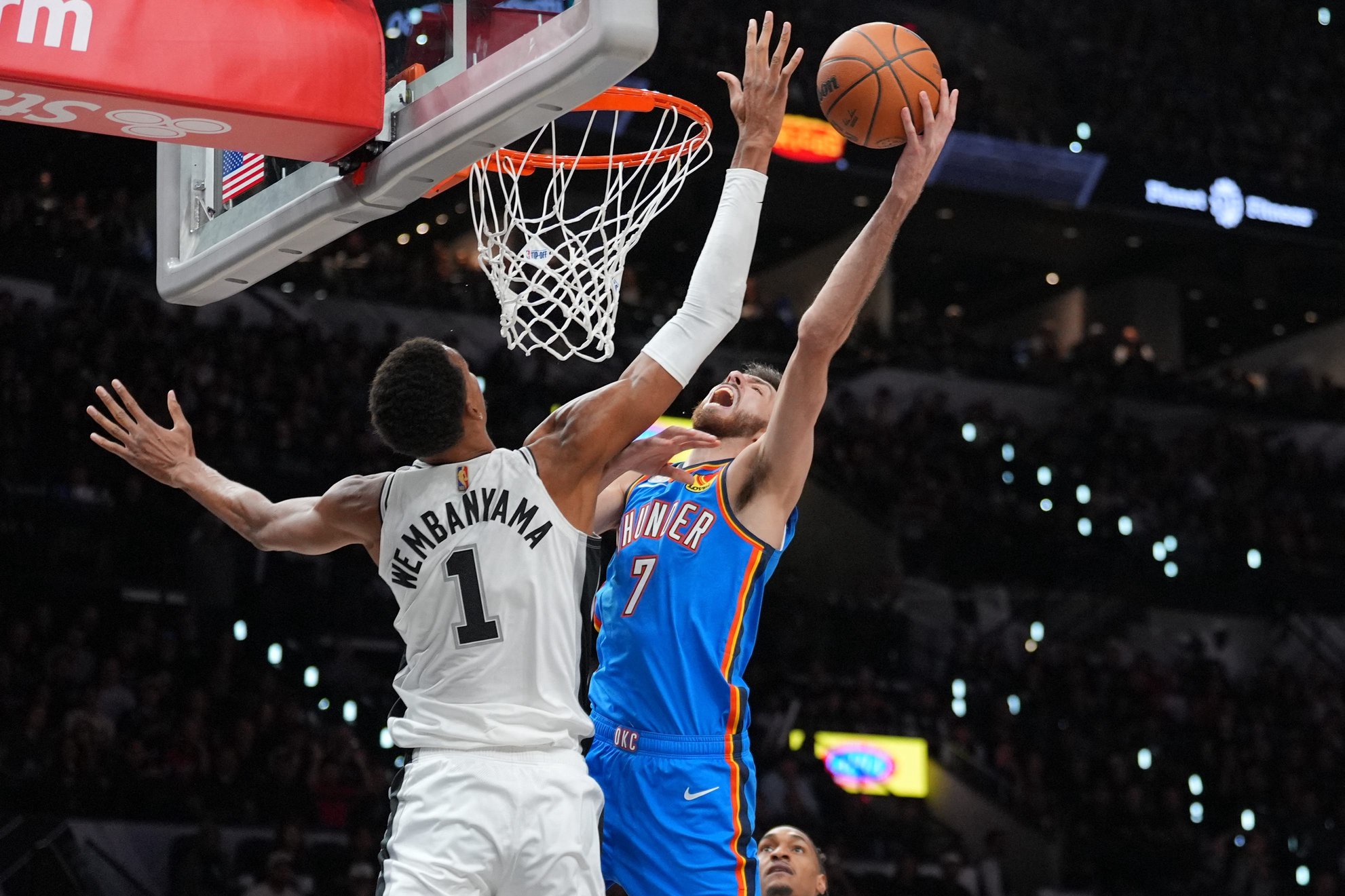 Oct 20, 2026; San Antonio, Texas, USA;  Oklahoma City Thunder center Chet Holmgren (7) shoots against San Antonio Spurs forward Victor Wembanyama (1) in the first half at Frost Bank Center.  Mandatory Credit: Daniel Dunn-Imagn Images