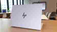 HP OmniBook X in Ceramic White on a table