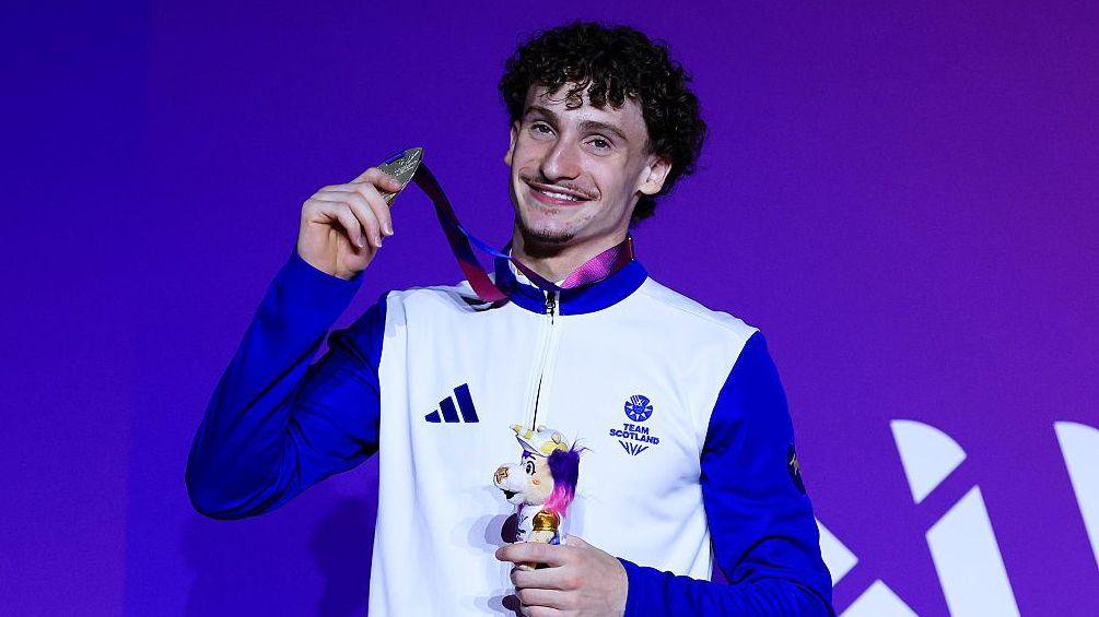 Reuben Ward receiving his pommel horse silver medal at the 2026 Commonwealth Games
