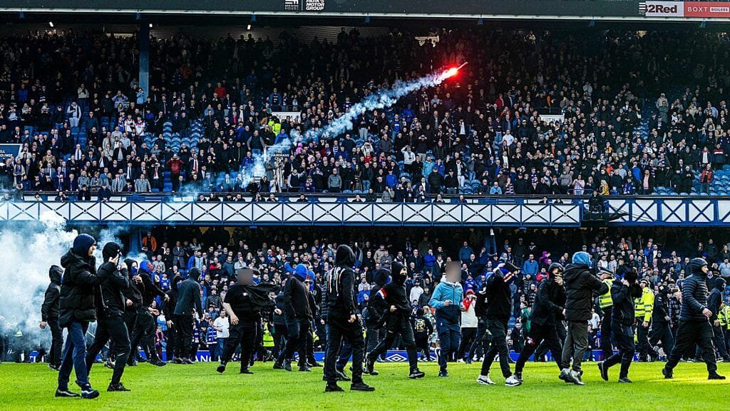 Rangers fan who encouraged mass pitch invasion at Old Firm jailed 