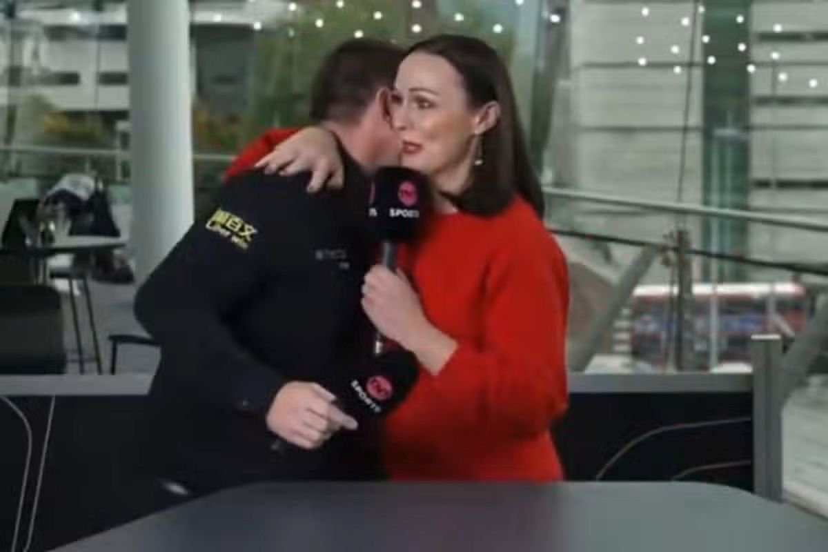 Snooker star Mark Allen is consoled by TNT Sports' Rachel Casey