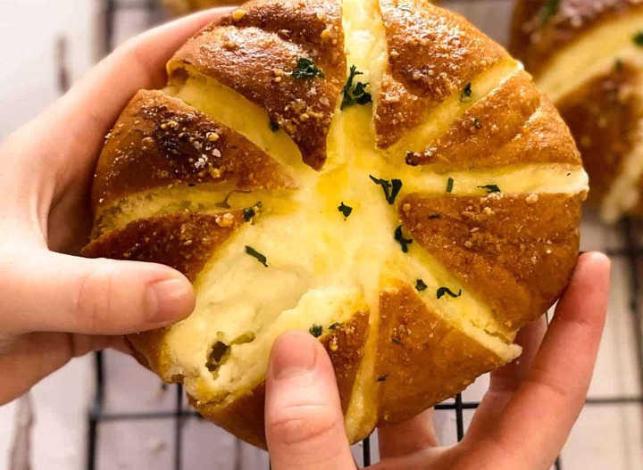 Slide 2 of 14: Who doesn't love cheesy bread? This clever creation makes for the perfect pre-dinner snack when you're looking for a fun alternative to your usual go-to charcuterie board.Get the recipe at Sunday Supper.RELATED: Get even more recipe ideas straight to your inbox by signing up for our newsletter!