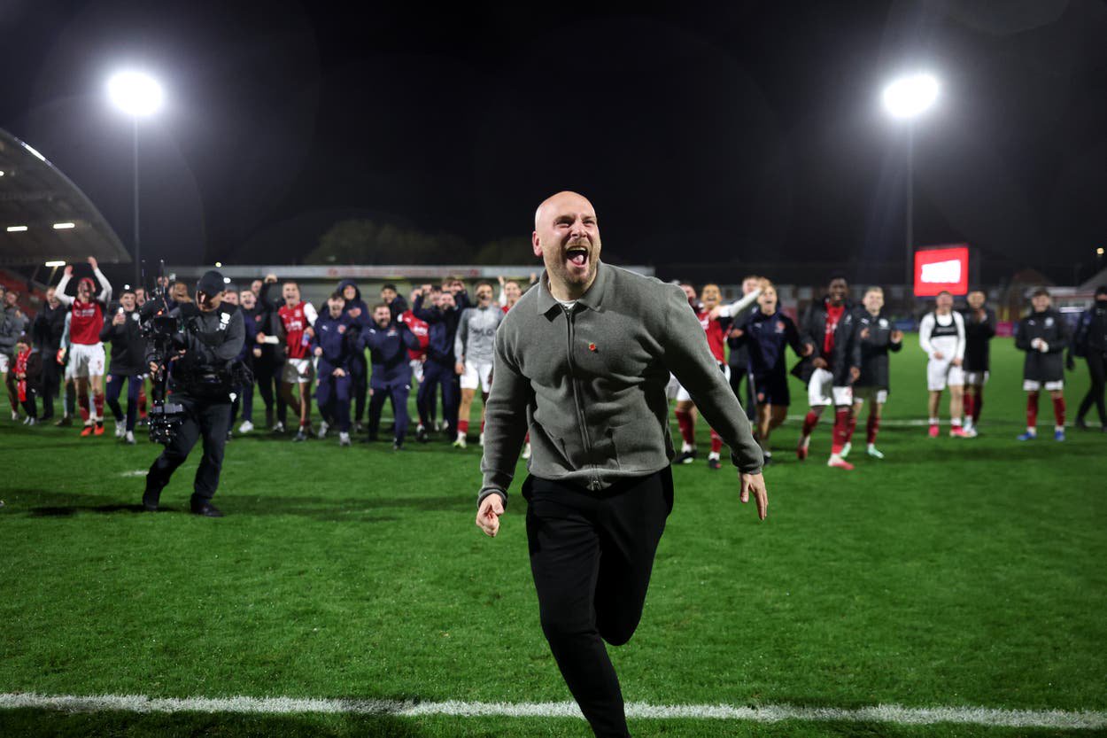 Fleetwood Town manager Matt Lawlor celebrates victory over Arsenal in the Carabao Cup