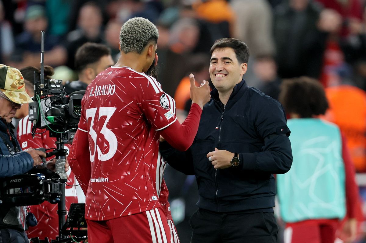 LIVERPOOL, ENGLAND - SEPTEMBER 9: Ronald Araujo of Liverpool and Andoni Iraola, Manager of Liverpool celebrate after winning the UEFA Champions League 2026/27 League Phase MD1 match between Liverpool FC and Atletico de Madrid at Anfield on September 9, 2026 in Liverpool, England. (Photo by Richard Sellers/Sportsphoto/Allstar via Getty Images)