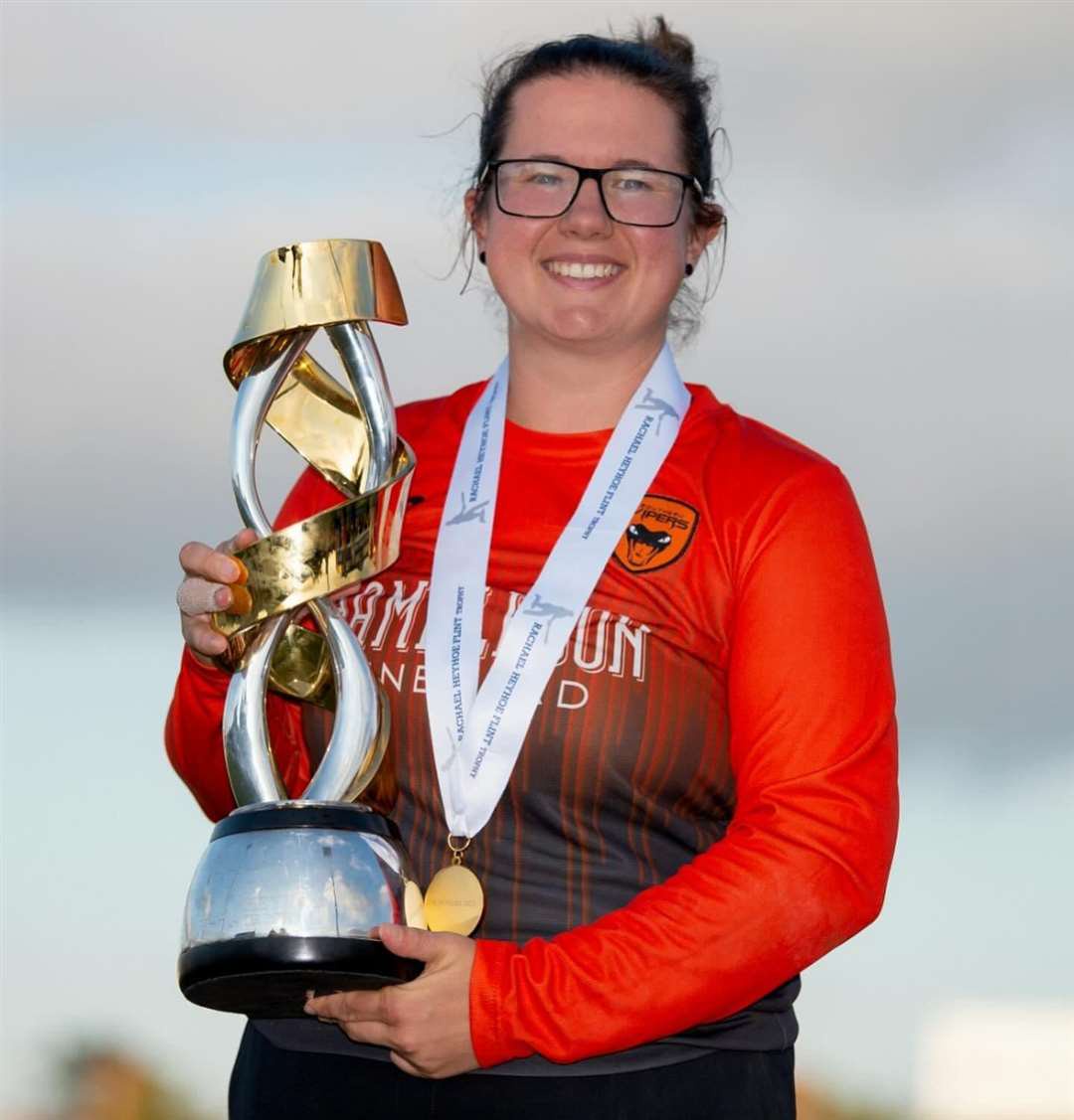 Charlotte Taylor with the Rachael Heyhoe Flint Trophy