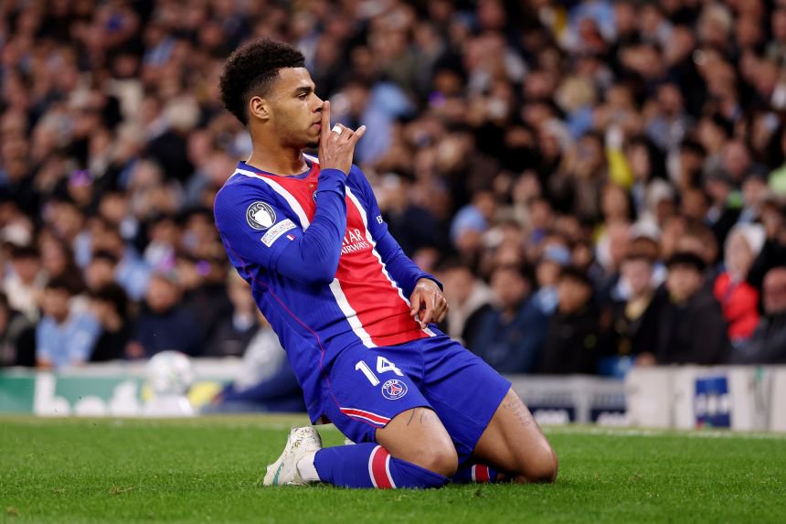 Desire Doue of Paris Saint-Germain celebrates scoring his team’s first goal against Manchester City in Manchester, England, on October 14.