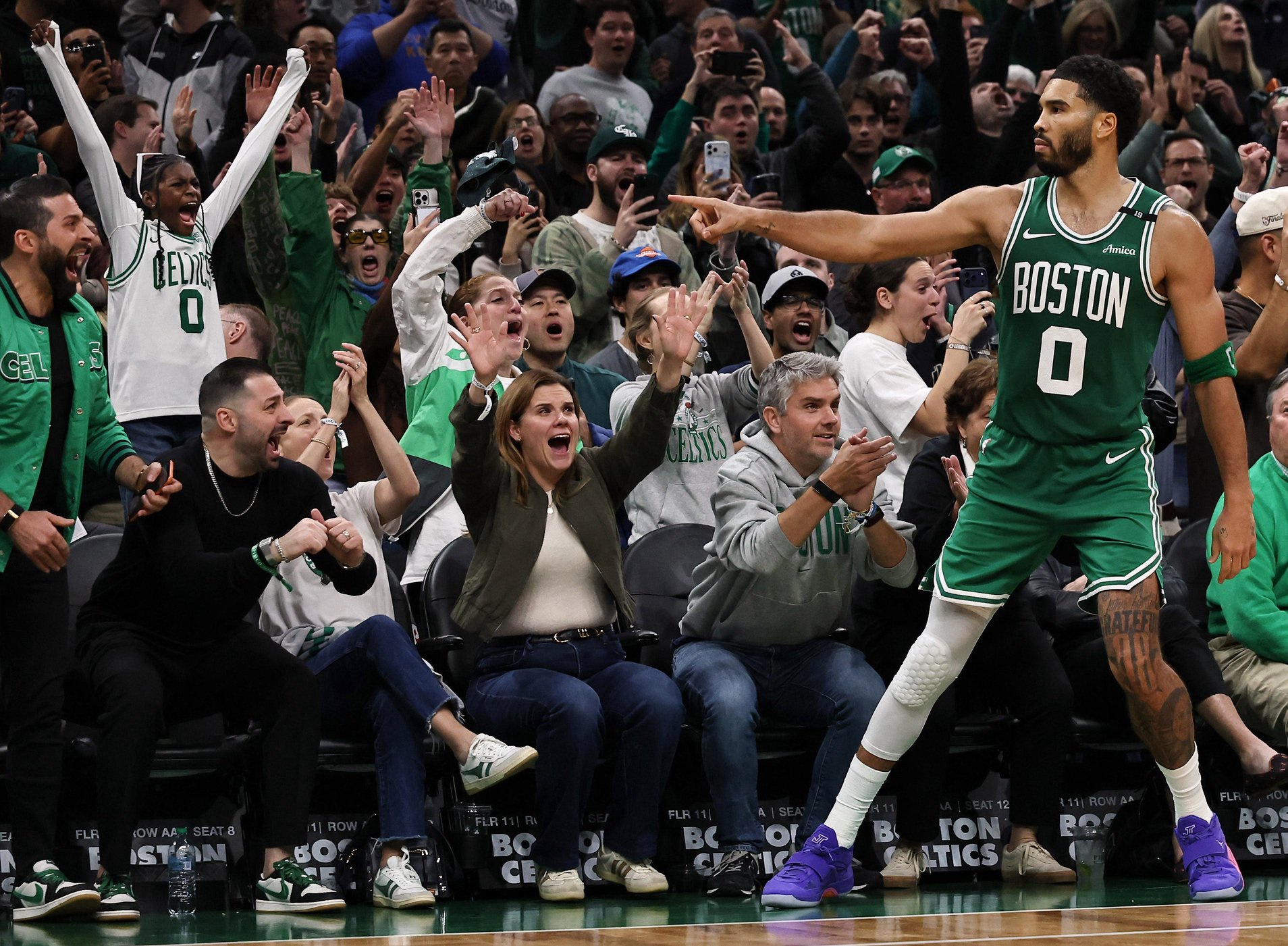 Oct 23, 2026; Boston, Massachusetts, USA; Boston Celtics forward Jayson Tatum (0) points to the crowd after making a three point basket during the second half of their win over the New York Knicks at TD Garden. Mandatory Credit: Winslow Townson-Imagn Images