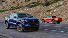 Blue and red 2024 Toyota Tacoma TRD Sport
