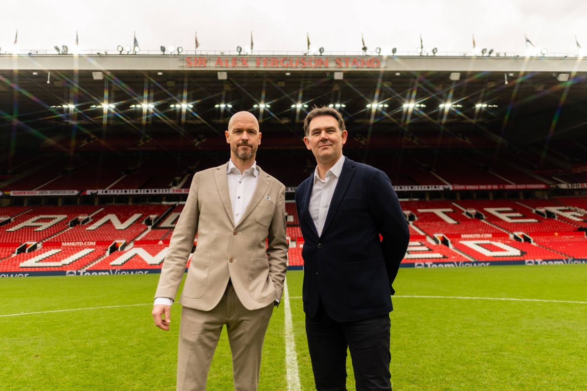 Erik ten Hag poses with Football Director John Murtough at Old Trafford on May 23, 2022. 