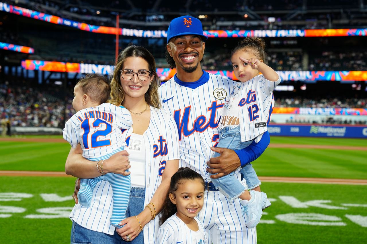 Francisco Lindor and Katia Lindor with their family.Credit: Mary DeCicco/MLB Photos via Getty