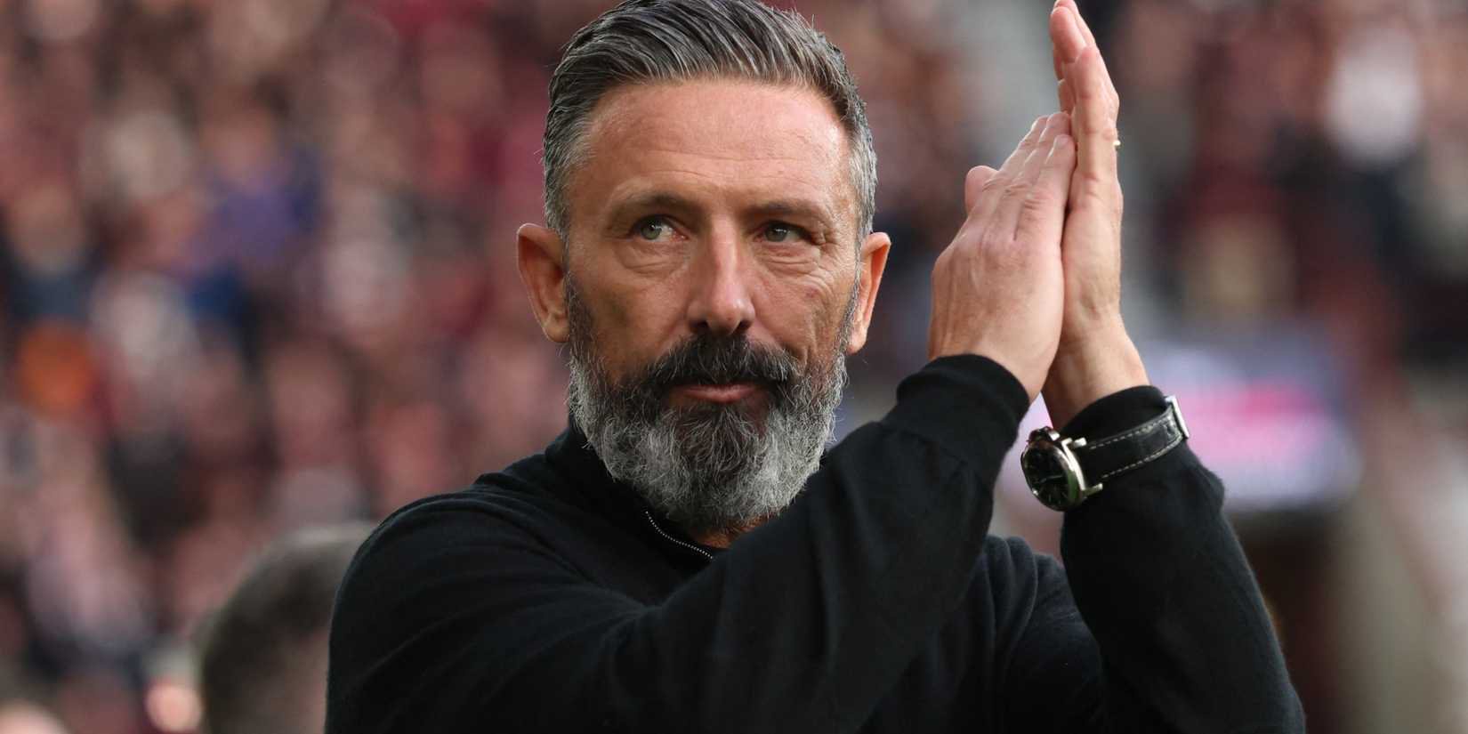 Derek McInnes claps the Hearts fans