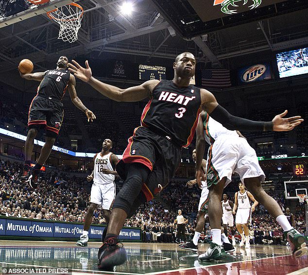 Cai's mural recreates AP photographer Morry Gash's iconic 2010 image of James and his then-Heat teammate Dwyane Wade finishing off a fast break against the Milwaukee Bucks