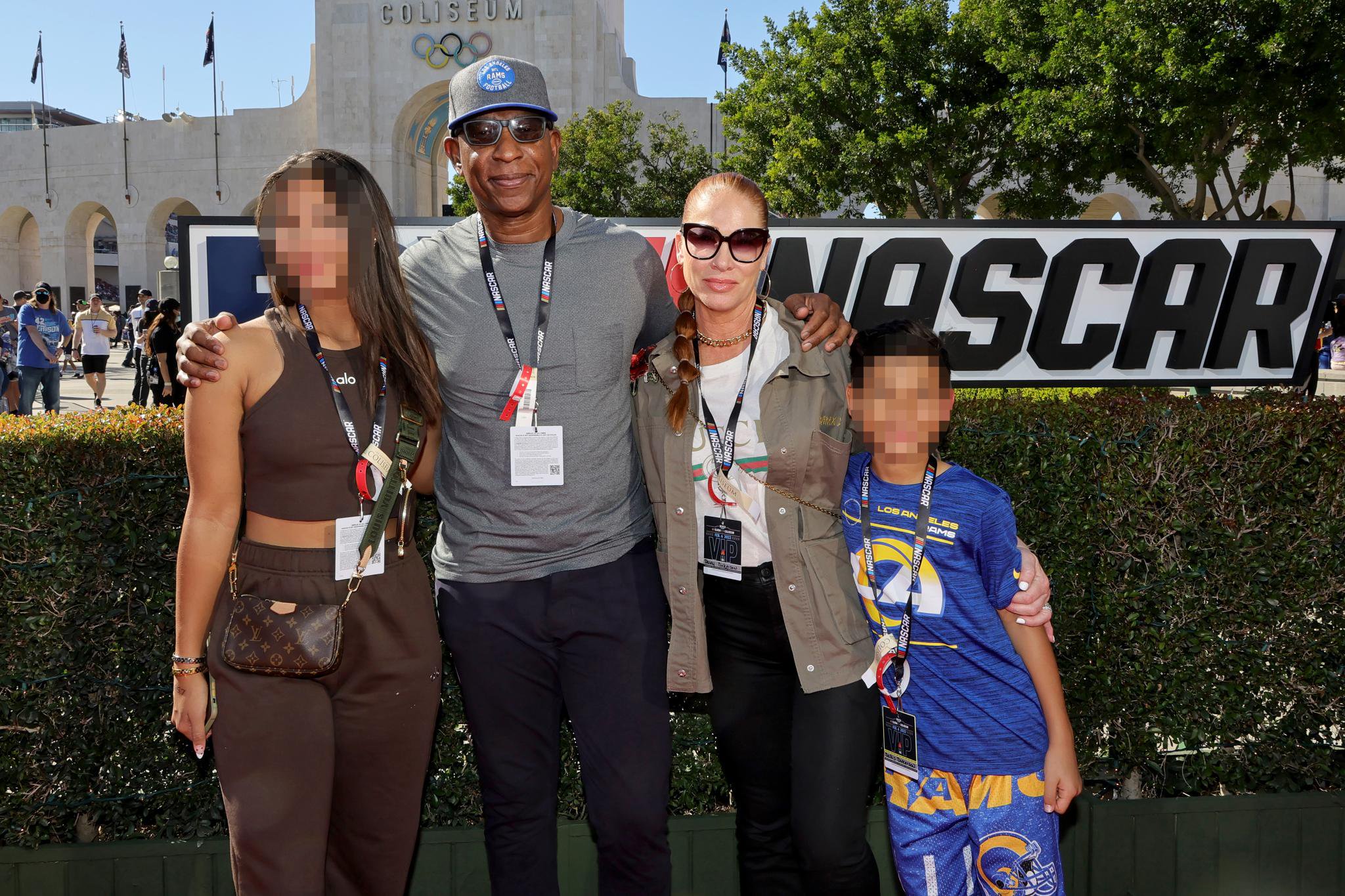Erica Dickerson, Eric Dickerson, Penny Sutton, and Dallis Dickerson pose for a photo at the Los Angeles Coliseum.
