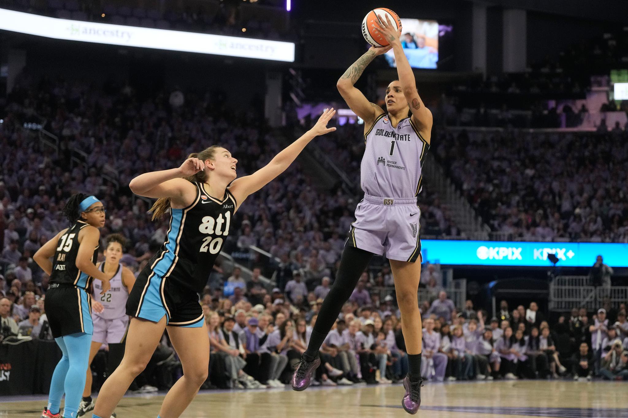 Golden State Valkyries forward Gabby Williams shoots over Atlanta Dream guard Isobel Borlase.