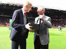 Former manager Sir Alex Ferguson of Manchester United presents Manager Arsene Wenger of Arsenal with a gift to mark his retirement ahead of the Pre...