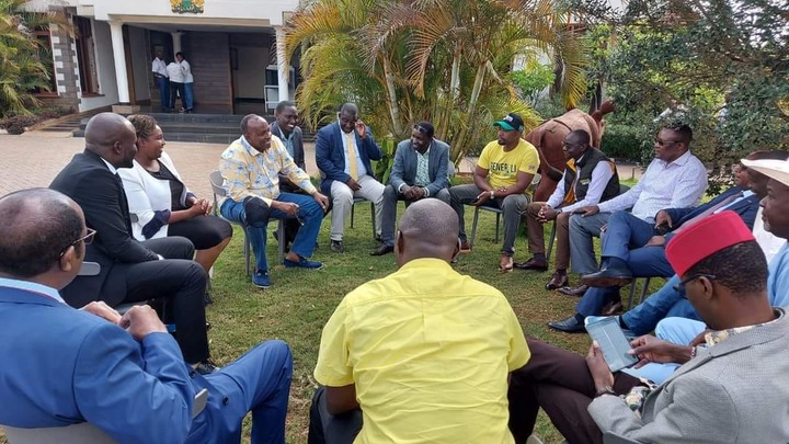 May be an image of 11 people, people standing, people sitting and outdoors